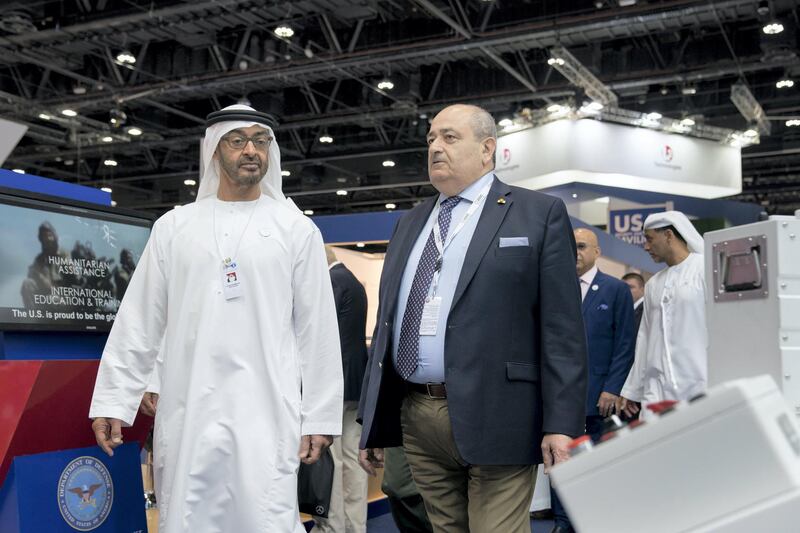 ABU DHABI, UNITED ARAB EMIRATES - February 21, 2019: HH Sheikh Mohamed bin Zayed Al Nahyan, Crown Prince of Abu Dhabi and Deputy Supreme Commander of the UAE Armed Forces (L), visits Hellenic Defense Systems stand, during the 2019 International Defence Exhibition and Conference (IDEX), at Abu Dhabi National Exhibition Centre (ADNEC). 

( Ryan Carter for the Ministry of Presidential Affairs )
---