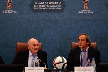 Former FIFA President Sepp Blatter and former UEFA President Michel Platini in 2015. (Photo by Shaun Botterill/Getty Images)