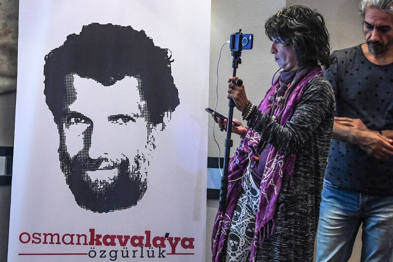 A poster featuring jailed businessman and philanthropist Osman Kavala in 2018. AFP