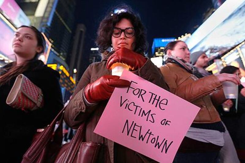 A candlelight vigil in Times Square, for the victims. Carlo Allegri / Reuters