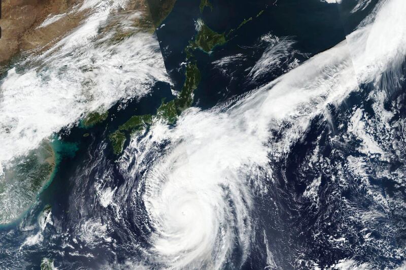 This Oct. 10, 2019, satellite photo taken by NASA-NOAA's Suomi NPP satellite shows typhoon Hagibis approaching Japan. NASA Worldview, Earth Observing System Data and Information System. AP