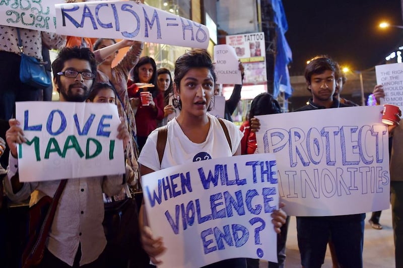 IIndian students stage a vigil in support of Tanzanians who were  assaulted by a mob in Bangalore. Maniunath Kiran /AFP