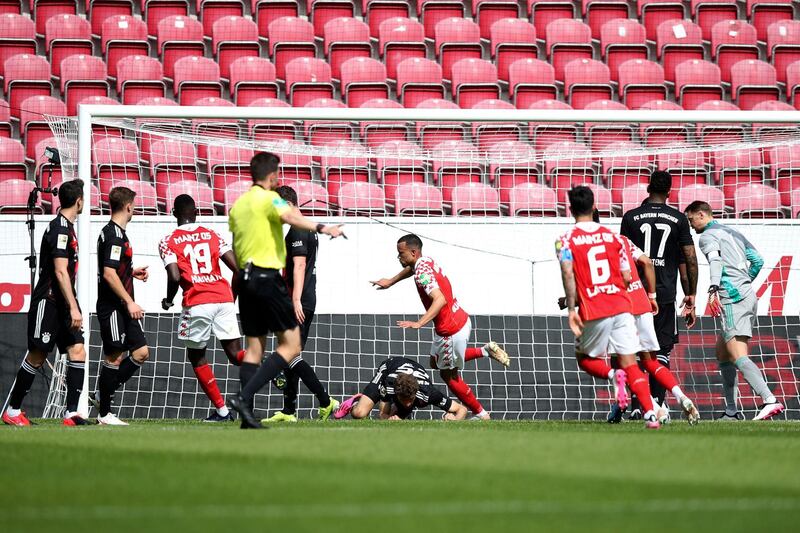 Mainz's Robin Quaison celebrates after scoring his side's second goal against Bayern Munich. AP