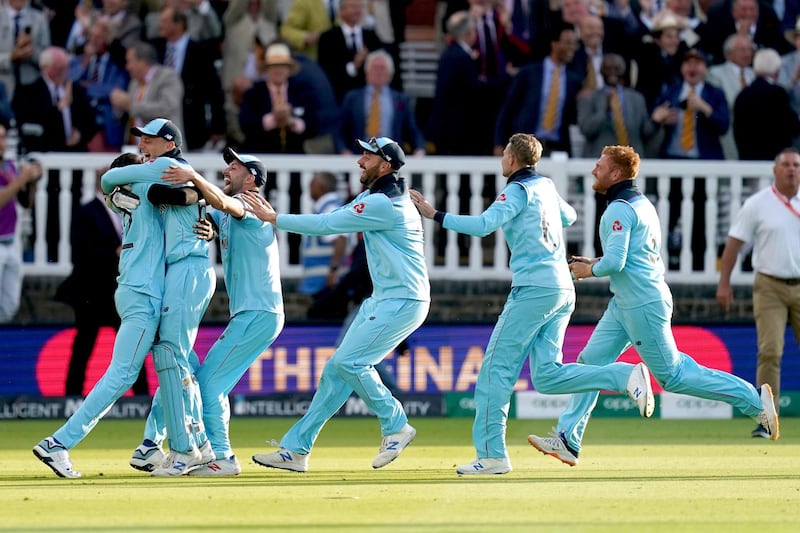 England players celebrate after clinching victory. PA