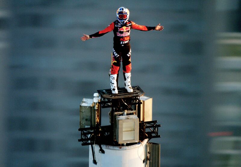 Dakar Rally rider Sam Sunderland stands on top of Burj Khalifa in new tourism video. Photo: Dubai Tourism