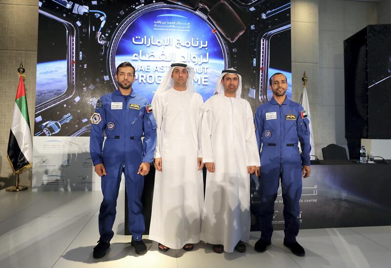 Dubai, United Arab Emirates - Reporter: Sarwat Nasir: Salem Humaid Al Marri (2nd L), assistant DG, Science and technology sector, Head of the UAE astronaut program, Yusuf Al Shaibani, Director general of MBRSC, Sultan Al Neyadi (L), back-up astronaut and the UAE's first Emirati astronaut Hazza Al Mansoori (R). Press conference by MBRSC to announce details of search for next UAE astronaut. Tuesday, 3rd of March, 2020. Downtown, Dubai. Chris Whiteoak / The National