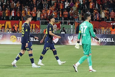 Fenerbahce's players leave the pitch during the Turkish Super Cup match between Fenerbahce and Galatasaray in Sanliurfa, Turkey, 07 April 2024.  After three minutes of the rescheduled Turkish Super Cup match, Fenerbahce, who played with their Under-19 team, staged a protest forcing the game to be abandoned.   EPA / STR