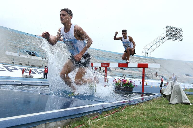 Carlos Jhonson and Dylan Van Der Hock of Argentina compete in the men's 3000 metres steeplechase during the South American Championships at Estadio Modelo Alberto Spencer in Ecuador on May 30. Getty
