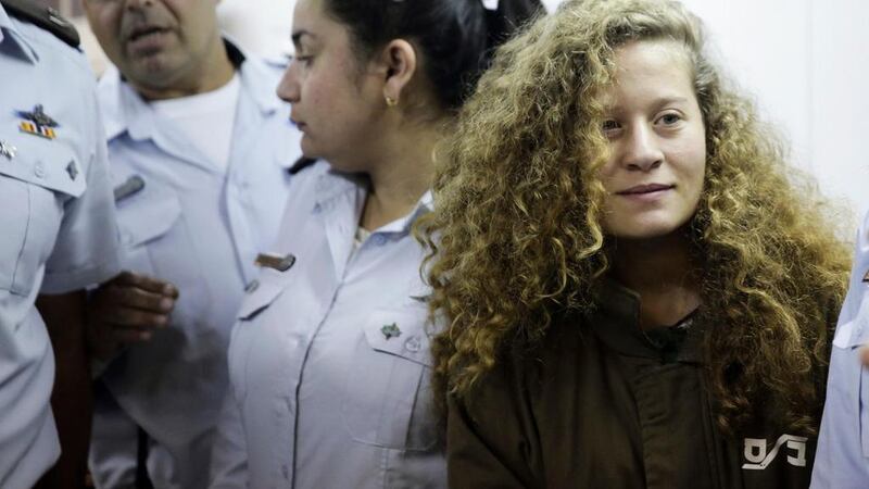 Ahed Tamimi's crime was to lay her hands on a pair of heavily armed Israeli soldiers who had no business being in her West Bank village.  AP File Photo