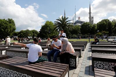 Tourists at Sultanahmet Square in Istanbul. The Turkish city is seeing a drop in airfares over summer. Photo: Reuters