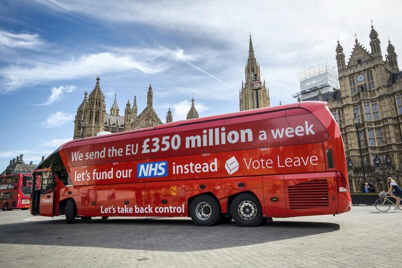 LONDON, ENGLAND - JULY 18: A 'Vote LEAVE' battle bus is parked outside the Houses of Parliament in Westminster by the environmental campaign group Greenpeace before being re-branded on July 18, 2016 in London, England. The bus which was used during the European Union (EU) referendum campaign and had the statement "We send the EU Â£350 million a week let's fund our NHS instead" along the side was today covered with thousands of questions for the new Prime Minister Theresa May and her government about what a 'Brexit' might mean for the environment. (Photo by Jack Taylor/Getty Images)