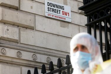 The UK government's handling of the pandemic has been met with protest and criticism. Reuters