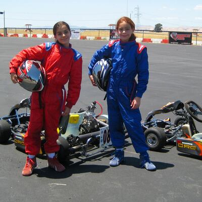 Toni, left, and her twin sister Annie go-karting in 2009. Courtesy Toni Breidinger