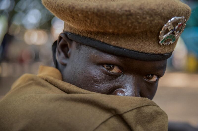 A newly released child soldier attends a release ceremony in Yambio, South Sudan, on February 7, 2018. - More than 300 child soldiers, including 87 girls, have been released in South Sudan's war-torn region of Yambio under a programme to help reintegrate them into society, the UN said on on Februar y 7, 2018. A conflict erupted in South Sudan little more than two years after gained independence from Sudan in 2011, causing tens of thousands of deaths and uprooting nearly four million people. The integration programme in Yambio, which is located in the south of the country, aims at helping 700 child soldiers return to normal life. (Photo by Stefanie Glinski / AFP)