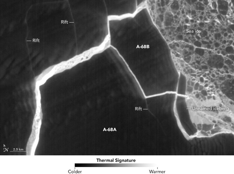 epa06111834 A handout photo made available by NASA on 27 July 2017 shows a false-color image acquired by the Thermal Infrared Sensor (TIRS) on the Landsat 8 satellite of a massive iceberg, named A-68, fractured into two bergs, named A-68A and A-68B, along Antarctica's Larsen C ice shelf, 21 July 2017. The false-color view shows the relative warmth or coolness across the region. White indicates where the ice or water surface is warmest, most notably in the widening strip of melange between the main iceberg and the remaining ice shelf. Dark grays and blacks are the coldest areas of ice. The Larsen C shelf area has shrunk around ten percent after a nearly 5,800 square kilometers iceberg, known as A-68, broke away.  EPA/NASA HANDOUT  HANDOUT EDITORIAL USE ONLY/NO SALES