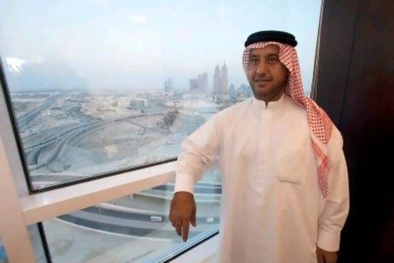 Emirati, Mohammed Ahmad Al Mulla, in his office in Dubai. A recruitment expert says the private sector finds it hard to attract Emirati talent because government agencies over better benefits for their employees.