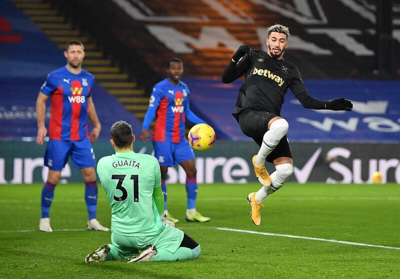 West Ham United's Said Benrahma in action with Crystal Palace's Vicente Guaita. Reuters