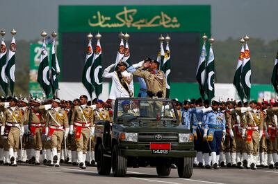 Pakistani troops march during a military parade to mark Pakistan National Day in Islamabad. AP