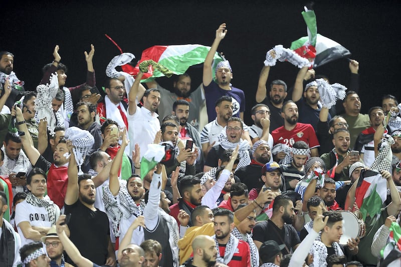 SHARJAH , UNITED ARAB EMIRATES , January  6 – 2019 :-  Palestinian  fans before the start of AFC Asian Cup UAE 2019 football match between Syria vs Palestine held at Sharjah Football Stadium in Sharjah. ( Pawan Singh / The National ) For News/Sports/ Big Picture