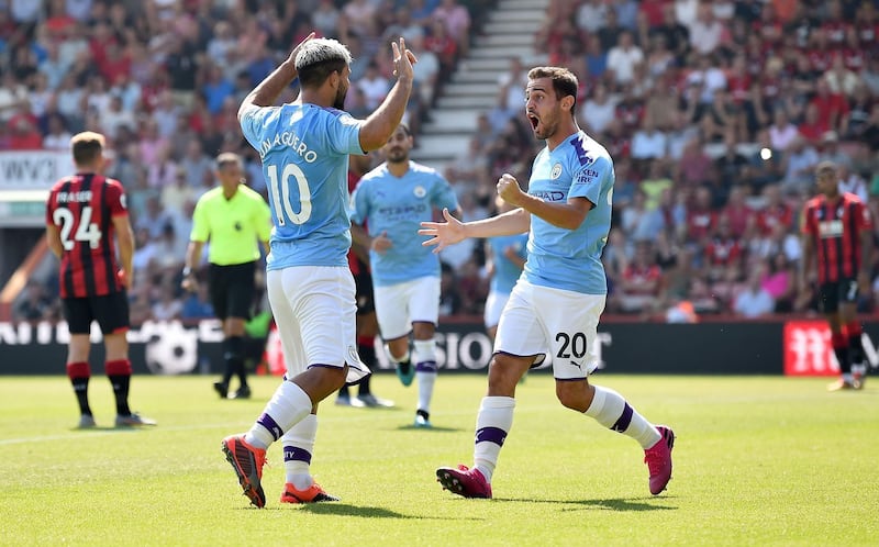 Manchester City's Sergio Aguero celebrates with Bernardo Silva. AFP