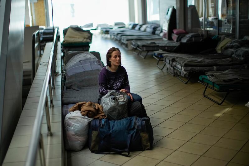 Iulia Shevchuk rests in a reception centre for displaced people in Dnipro, Ukraine. AP Photo