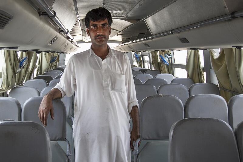 Shireen Zada, a bus driver from Pakistan, transports labourers from their camps to worksites. Mona Al Marzooqi / The National 