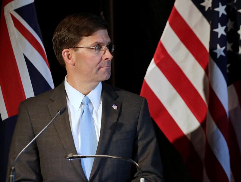 In this Aug. 4, 2019, photo, U.S. Secretary of Defense Mark Esper briefs the media following annual bilateral talks with Australian counterparts in Sydney, Australia. Esper said at last weekend's meetings that he wanted to deploy intermediate range conventional missiles at various Asia-Pacific sites within months.(AP Photo/Rick Rycroft)