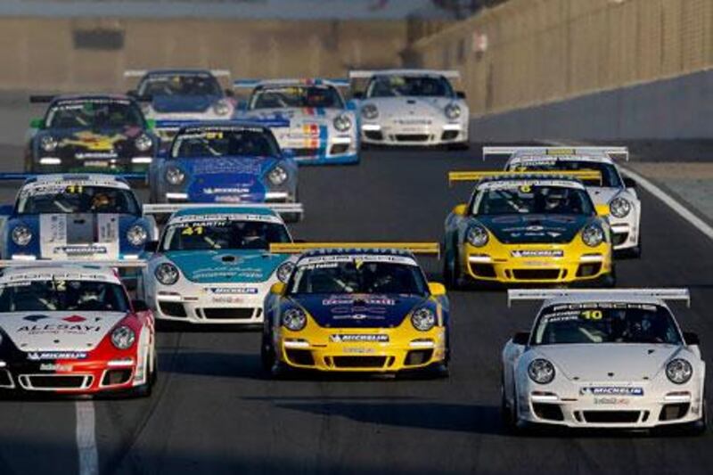 Clemens Schmid grabbed victory in Round 1 of the Porsche GT3 Cup Challenge Middle East at Dubai Autodrome Friday after a great battle with Saudi Arabia's Prince Abdulaziz Al Faisal.