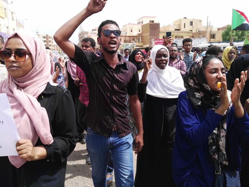 Sudanese protesters march during a demonstration in Bahri in the capital Khartoum's northern district on August 1, 2019, called for by the Sudanese Professionals Association (SPA) to denounce the Al-Obeid killings. A top Sudanese general has said the six protesters including four school children killed at a rally this week were shot dead by members of a feared paramilitary force. Tragedy struck Sudan's central city of Al-Obeid on Monday when the protesters were shot dead during a rally against a growing shortage of bread and fuel in the city. General Jamal Omar from the country's ruling military council accused members of the feared paramilitary Rapid Support Forces (RSF) of firing at the rally.
 / AFP / Ebrahim HAMID
