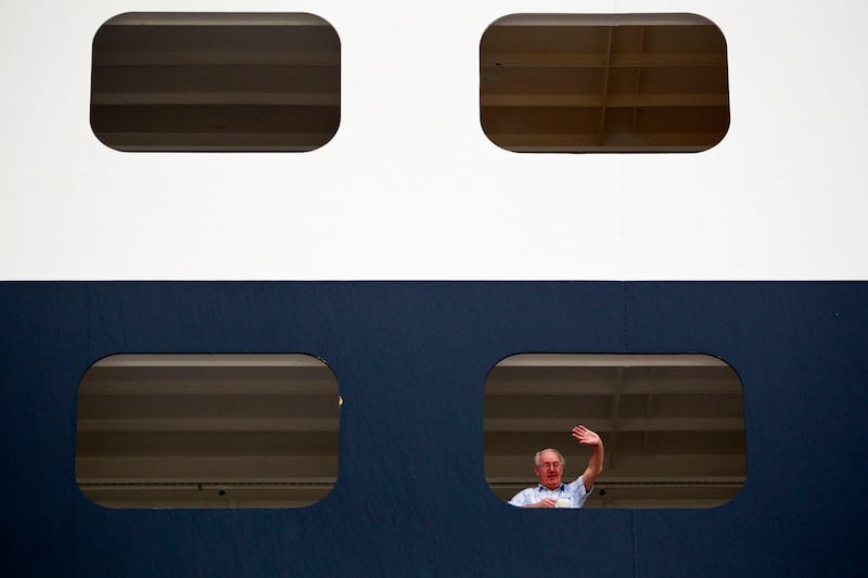 Abu Dhabi, United Arab Emirates, January 29, 2013:    Passengers wait to disembark from the Queen Mary 2 ocean liner after docking for the first time at Mina Zayed in Abu Dhabi on January 29, 2013. Christopher Pike / The National