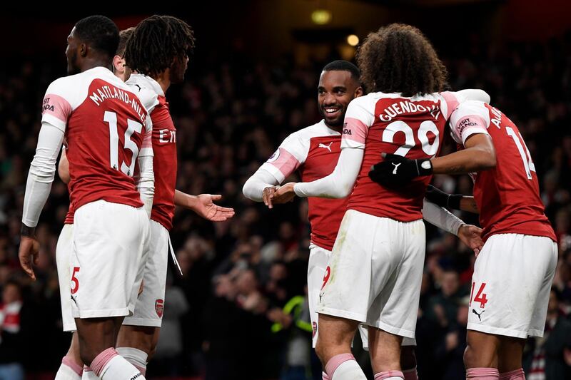 epa07479151 Arsenal's Alexandre Lacazette (C) celebrates after scoring during the English Premier League soccer match between Arsenal and Newcastle United at Emirates Stadium, London, Britain, 01 April 2019.  EPA/WILL OLIVER EDITORIAL USE ONLY. No use with unauthorized audio, video, data, fixture lists, club/league logos or 'live' services. Online in-match use limited to 120 images, no video emulation. No use in betting, games or single club/league/player publications