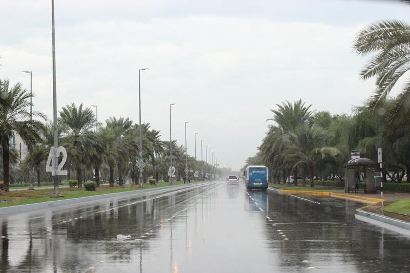 Roads in Abu Dhabi were slick and treacherous as the rain came down. Mariam Alnuaimi / The National