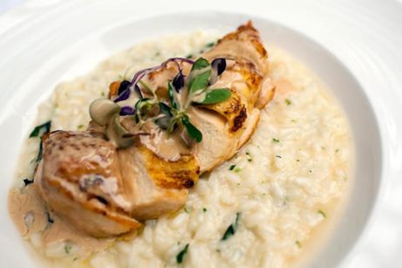 Lemon risotto with corn-fed chicken and foie gras sauce.