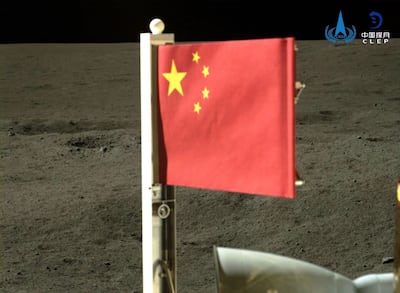 A Chinese flag planted on the Moon's far side. EPA