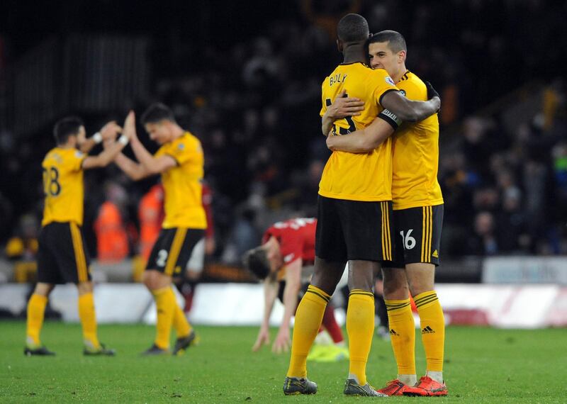 Wolves' Conor Coady and Willy Boly celebrate at the end of the match. AP Photo