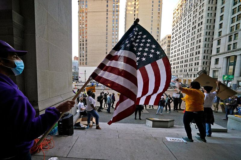 A group supporting the counting of every vote gathers on the steps of the City-County Building in downtown Pittsburgh. AP Photo