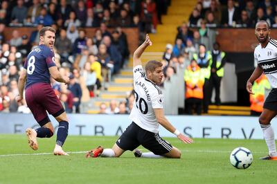 LONDON, ENGLAND - OCTOBER 07:  Aaron Ramsey of Arsenal scores his team's third goal during the Premier League match between Fulham FC and Arsenal FC at Craven Cottage on October 7, 2018 in London, United Kingdom.  (Photo by Catherine Ivill/Getty Images)