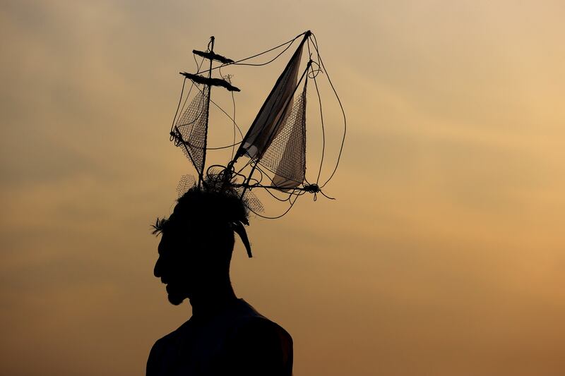 You won't find someone else wearing the same outfit if you put a boat on your head. Getty Images