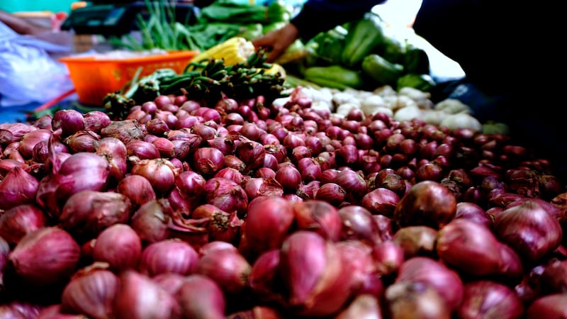 Onions on sale at a market in East Kalimantan. Unsplash