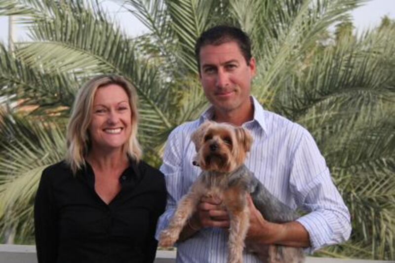 Marcus Lee, his wife Julie and dog Dudley. The couple had hoped to return to Australia after Mr Lee's acquittal but that has now been appealed by prosecutors. Picture courtesy Lee family.