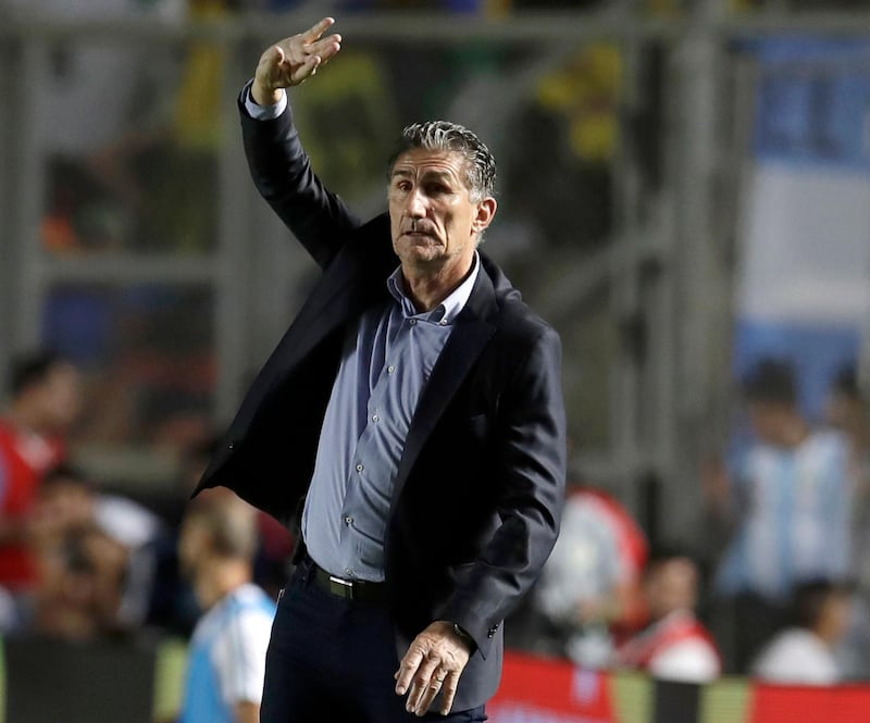 FILE - In this Nov. 15, 2016, file photo, then Argentina's coach Edgardo Bauza gives instructions to his players during a 2018 World Cup qualifying soccer match against Colombia in San Juan, Argentina. Bauza replaced Bert van Marwijk as head coach of Saudi Arabia just days after the Dutchman led the team to its first qualifying spot at a World Cup since 2006. A win over Japan on Sept. 5, 2017 sealed Saudi Arabia��������s place at Russia in 2018, but van Marwijk, who took the job in 2015, and the Saudi Arabia Football Federation (SAFF) were unable to agree on a new contract.  (AP Photo/Natacha Pisarenko, File)