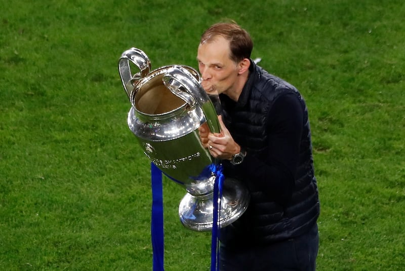 Soccer Football - Champions League Final - Manchester City v Chelsea - Estadio do Dragao, Porto, Portugal - May 29, 2021 Chelsea manager Thomas Tuchel celebrates with the trophy after winning the Champions League Pool via REUTERS/Susana Vera     TPX IMAGES OF THE DAY