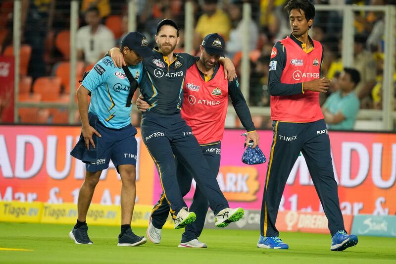 Gujarat Titans' Kane Williamson is carried off the field after picking up an injury while fielding during the IPL. AP