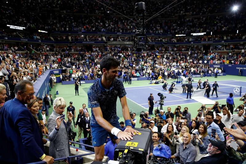 NEW YORK, NY - SEPTEMBER 09: Novak Djokovic of Serbia celebrates with his box after winning his men's Singles finals match against Juan Martin del Potro of Argentina on Day Fourteen of the 2018 US Open at the USTA Billie Jean King National Tennis Center on September 9, 2018 in the Flushing neighborhood of the Queens borough of New York City.   Julian Finney/Getty Images/AFP
== FOR NEWSPAPERS, INTERNET, TELCOS & TELEVISION USE ONLY ==
