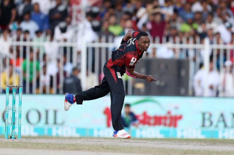 Dwayne Bravo of Lahore Qalandars bowling against Karachi Kings in the Pakistan Super League T20 match at Sharjah Cricket Stadium in Sharjah. ( Pawan Singh / The National )