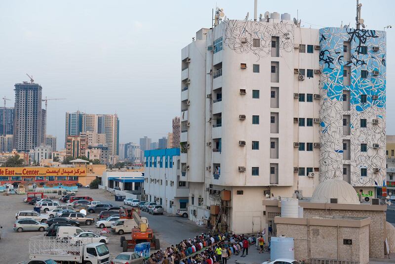 El Seed's latest work adorns a residential tower at the junction of Ajman's Badr and Al Ittihad Streets.