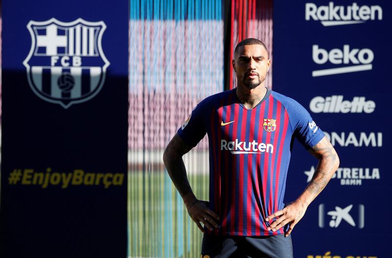 Kevin-Prince Boateng poses for photographs during the presentation. Reuters