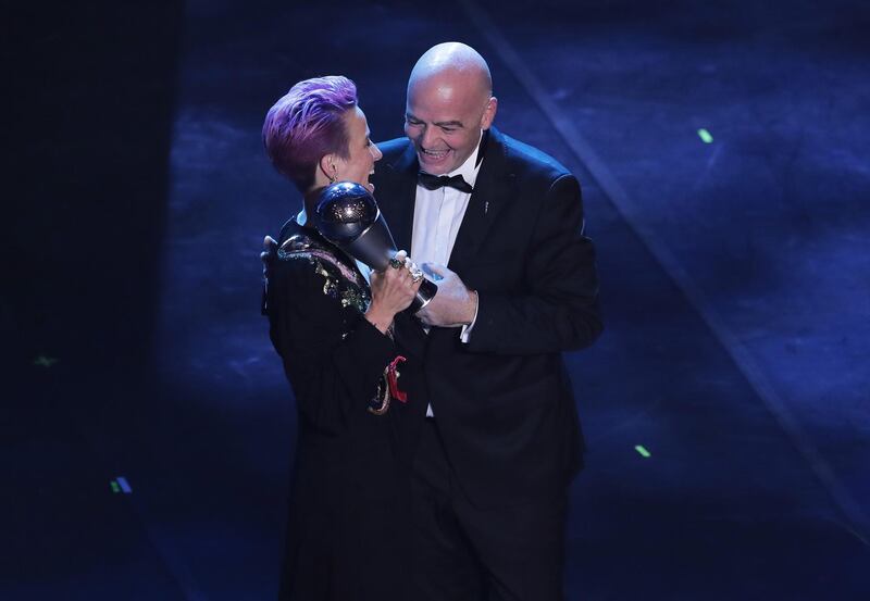 Megan Rapinoe receives The Best FIFA Women's Player of the Year award by FIFA President Gianni Infantino. Getty Images