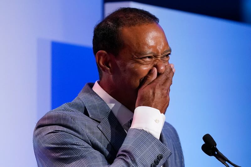 Tiger Woods becomes emotional during his induction into the World Golf Hall of Fame. AP