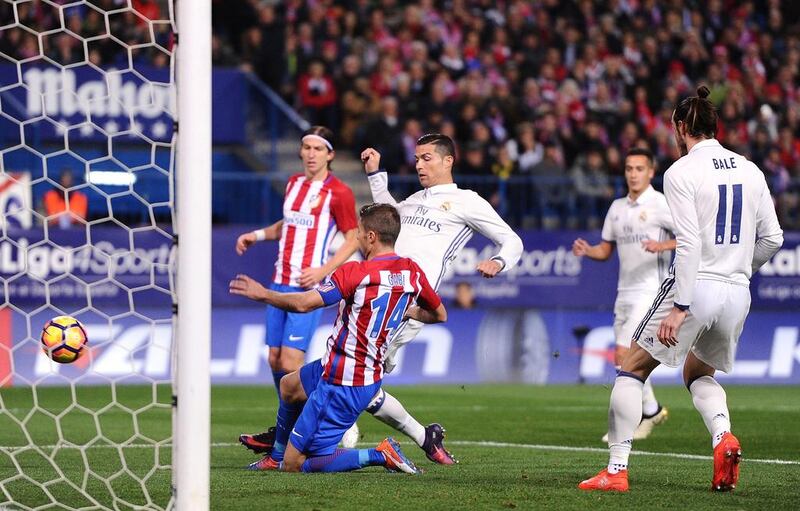 Cristiano Ronaldo of Real Madrid puts the ball in the net only for the goal to be disallowed. Denis Doyle / Getty Images